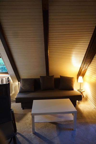Sofa bed on the attic floor
